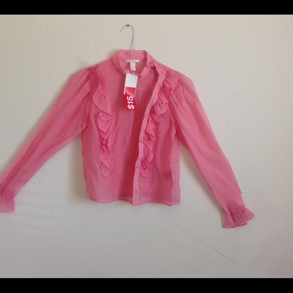 Pink blouse with ruffles